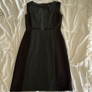 Black sleeveless mini zip up dress